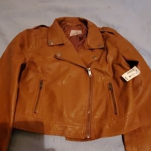 Leather jacket, brand new w/tag. Size of. Teen.